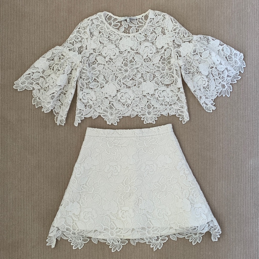 Chic white lace Alexis top and mini skirt set.